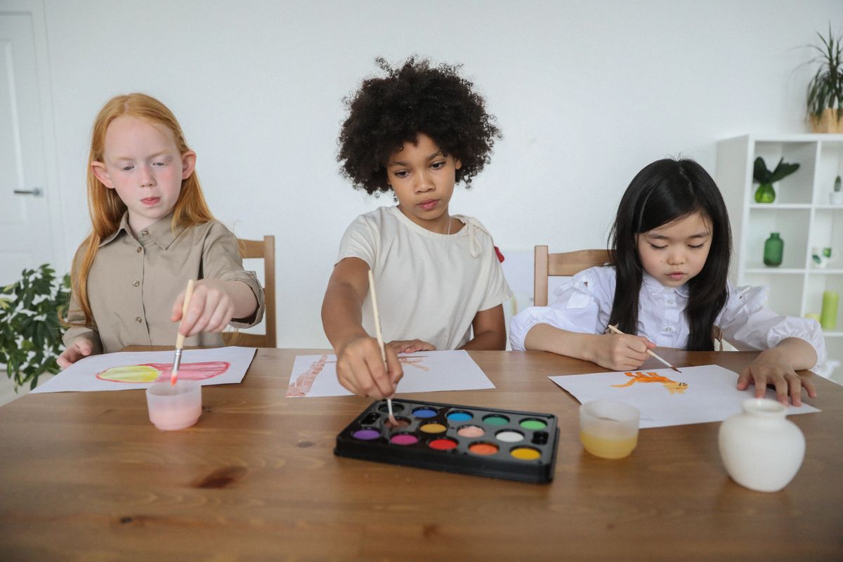 Teacher and children in a bright Montessori classroom at Shining Star Montessori Preschool, Anaheim